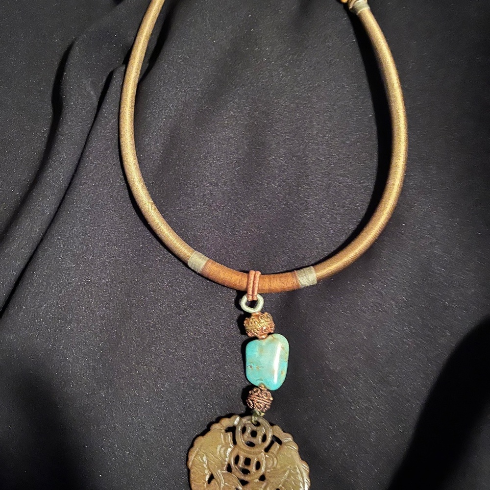 Handmade gorgeous necklace.  Purchased at a craft faire in Palm Springs.  Greens